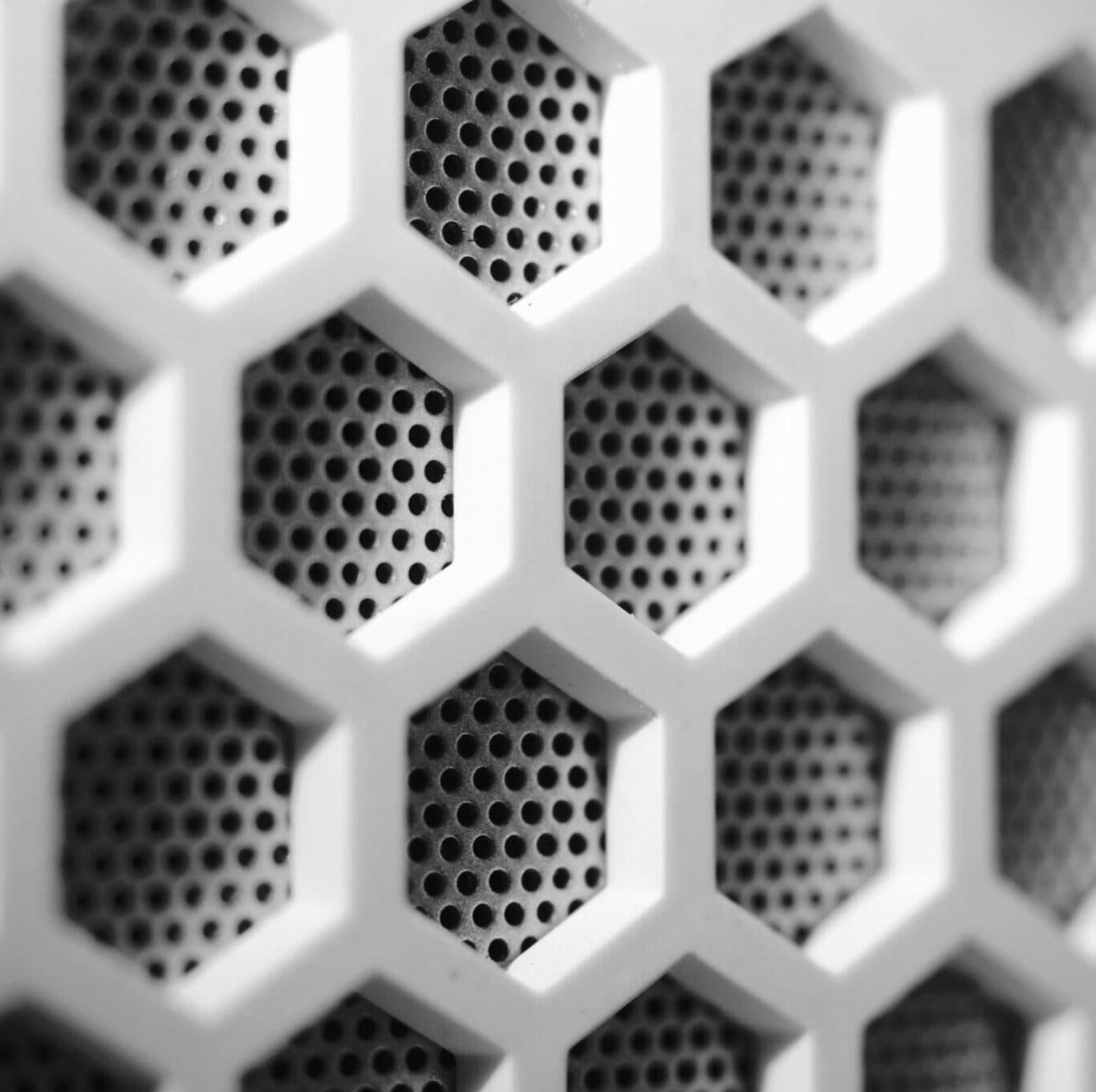 The honeycomb face of a polycarbonate grille